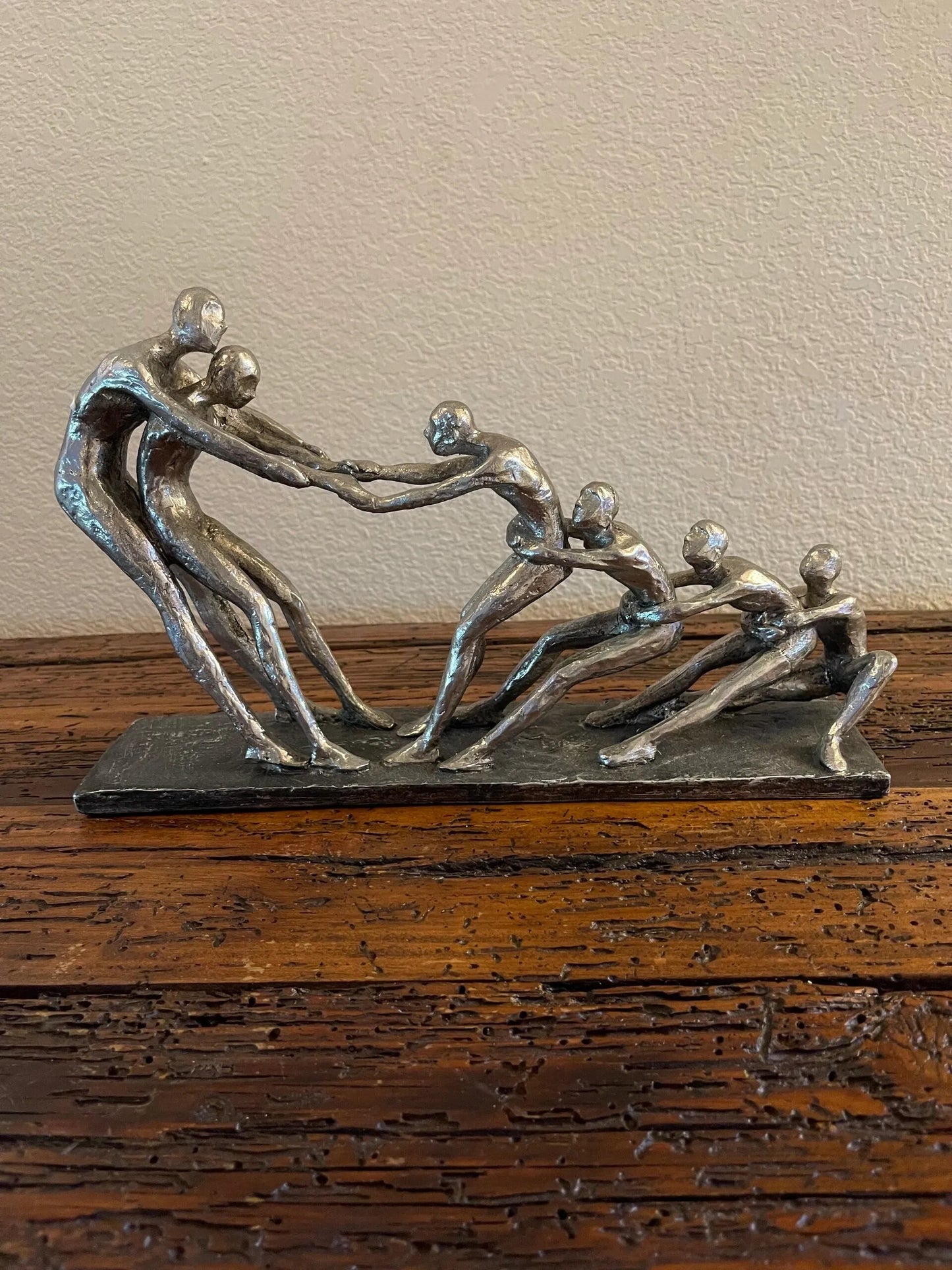 People Pulling Sculpture