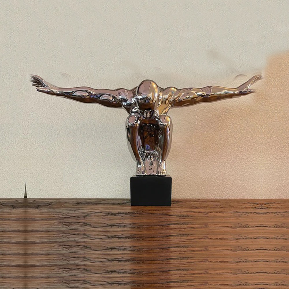 Silver Man Sculpture with Arms Out
